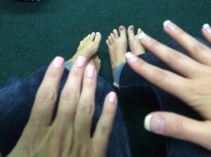 Nicole Luczak (formerly Erdody) and I show off our nails before her wedding.